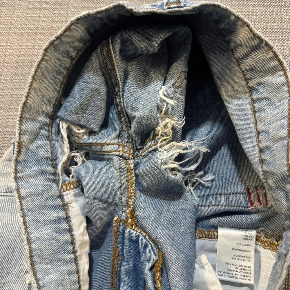 BDG Distressed blue denim shorts with frayed hem
